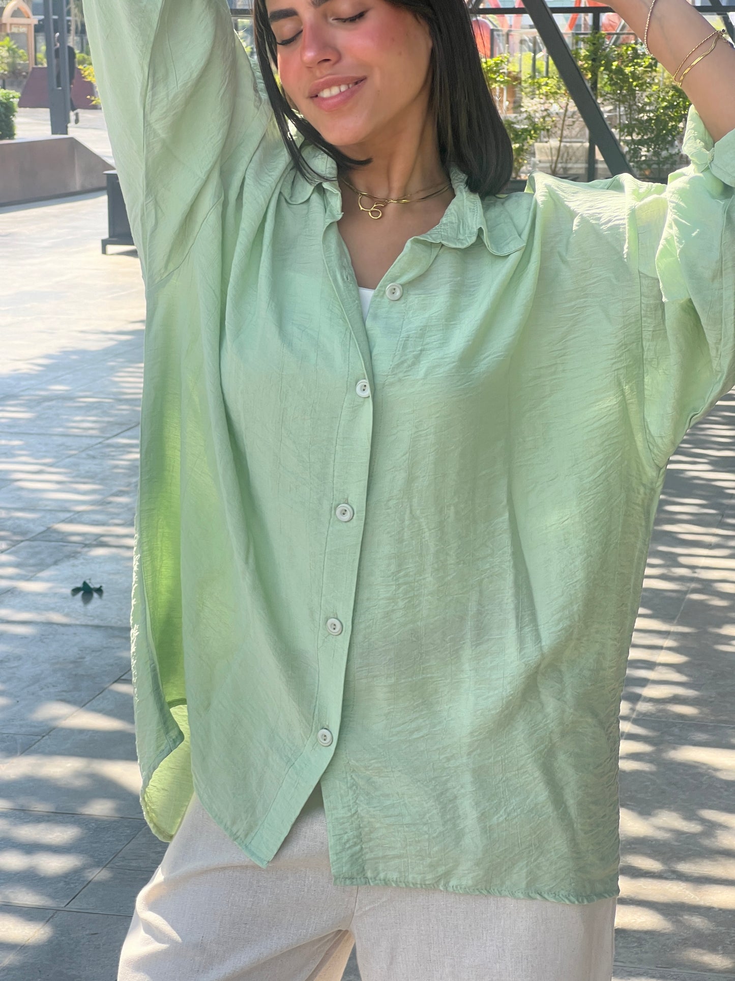 mint green shirt