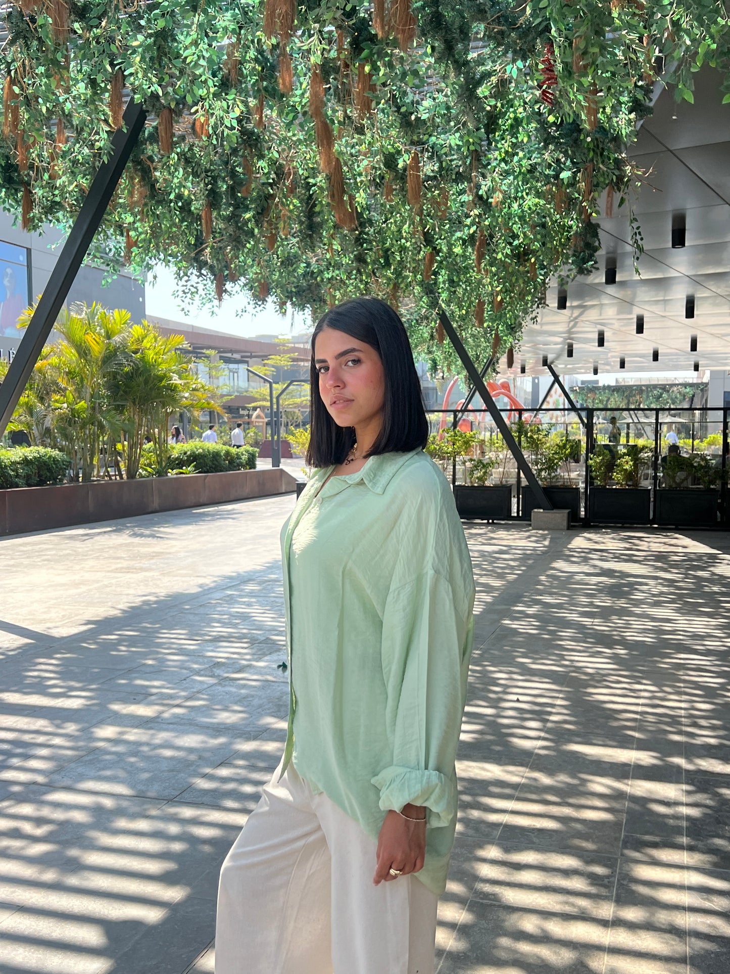 mint green shirt