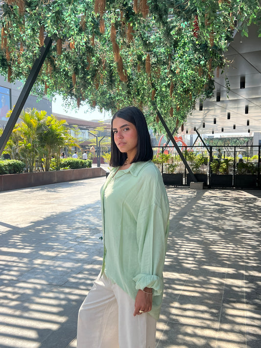mint green shirt