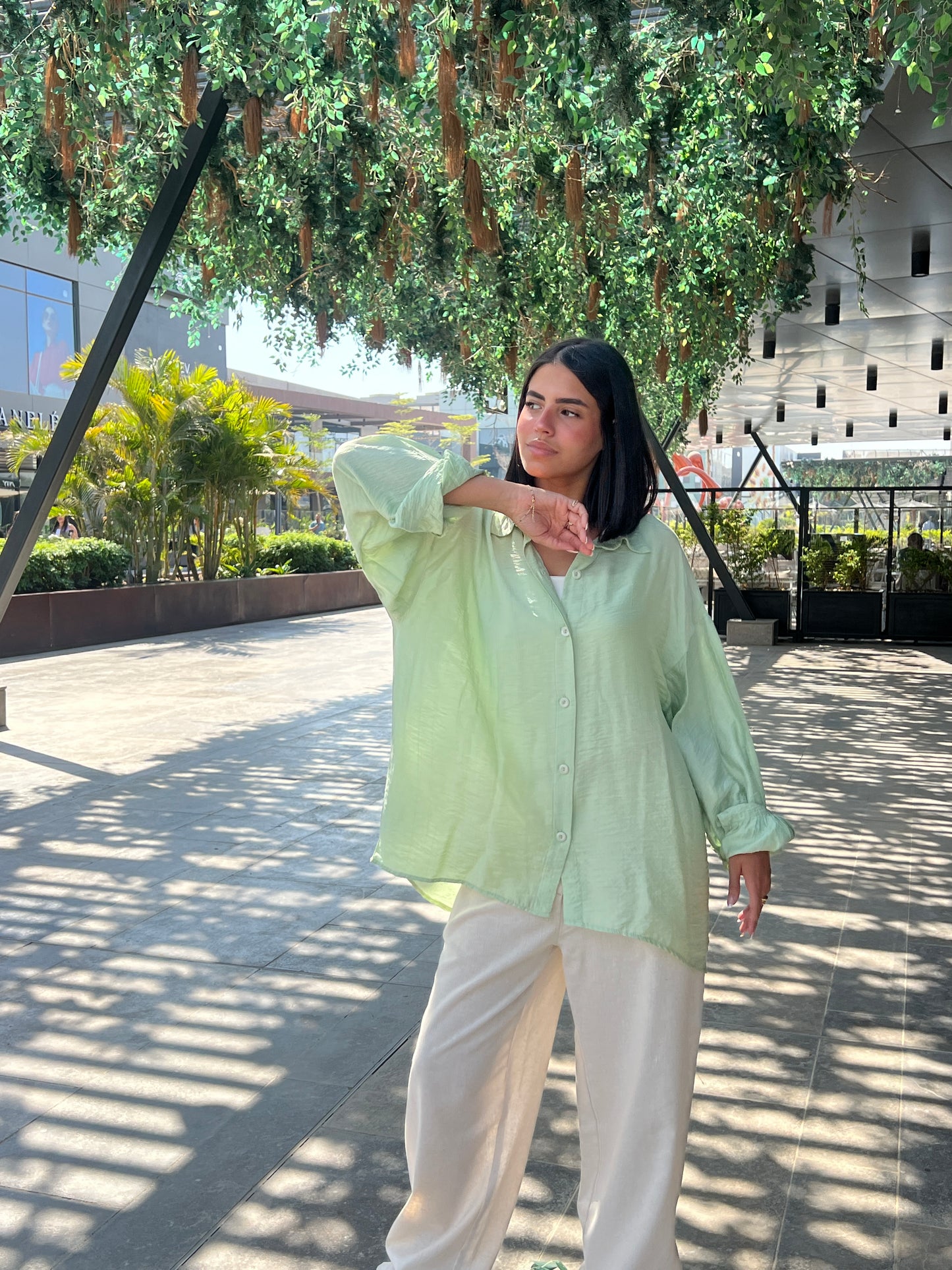 mint green shirt